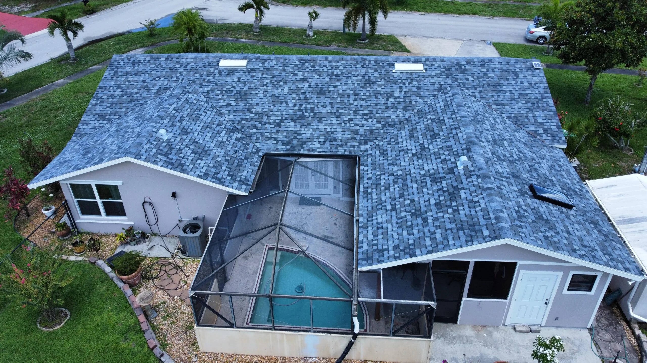 Aerial view of a Broward County shingle roof repair project completed by Qualitech Roofing